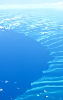 The Bahamas: aerial view of clouds and blue sea.