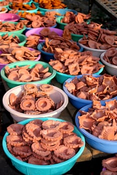 Traditional clay pots and lamps for sale during Diwali festival in India.