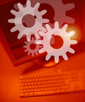 Gear symbol on Personal Computer background