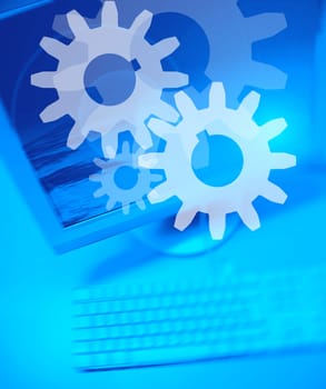 Gear symbol on Personal Computer background