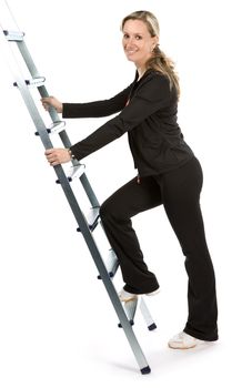 Young women with sportswear on ladder. White background