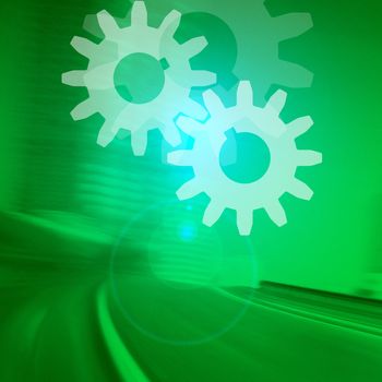 Gear on green background