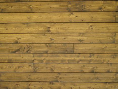 facing of wooden boards of a wall. Detail of an alpine refuge side