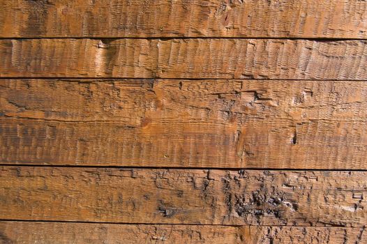 Facing of wooden boards of a wall. Detail of an alpine refuge side