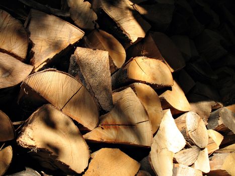 a woodpile of chestnut and beech for stoves