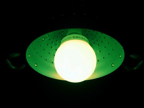 fluorescent lamp mounted in an aluminium pasta colander