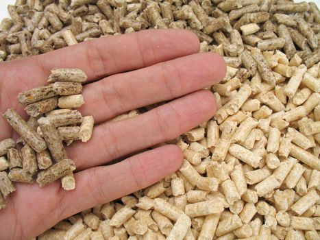 hand's giving wood pellets for fireplaces and stoves
