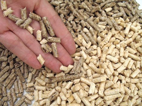 hand's giving wood pellets for fireplaces and stoves