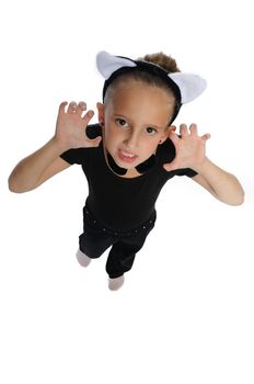 cute young girl posing in a dance costume on a white background