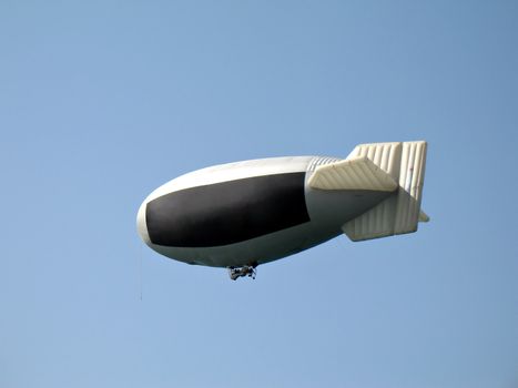 A dirigible airship used as a advertising media for your advertisement