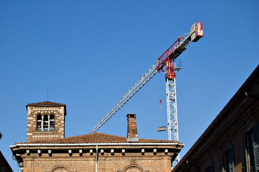 building yard with jib crane for house renovation