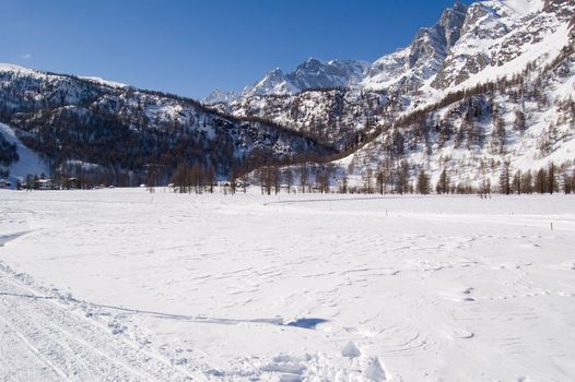 Sunny winter mountain landscape Alpe Devero; Alps, Italy