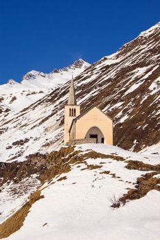 A small church in a winter landscape, Val Formazza, Alps, Italy