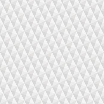 seamless texture of grey to white squares and triangles giving optical illusion
