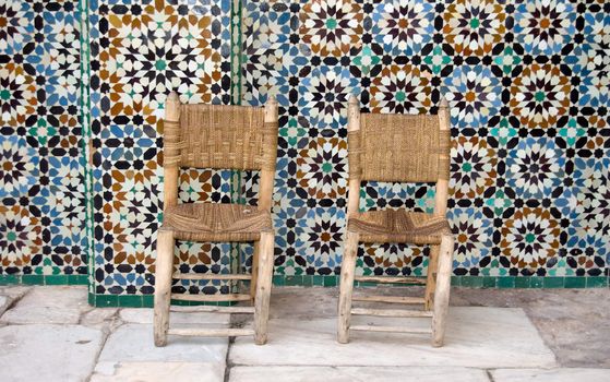 Two chairs and zellij tiles, Ben Youssef Medersa, Marrakesh