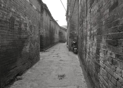 empty, narrow street in a small village