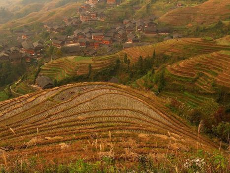 rice terraces and a village, guilin, china