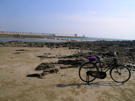 Old bicycle on the beach