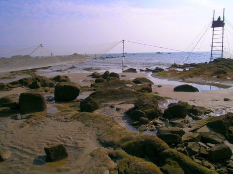 fishing net spread near the seashore