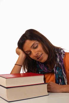 Middle eastern student in an uninterested attitude towards her books