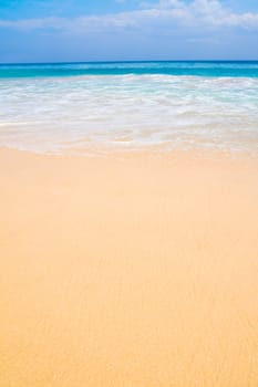 Paradise beach with blue sky and water and white sand in Bali, Indonesia..