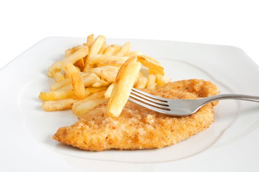 detail of fried potatoes and chicken with fork isolated on white background