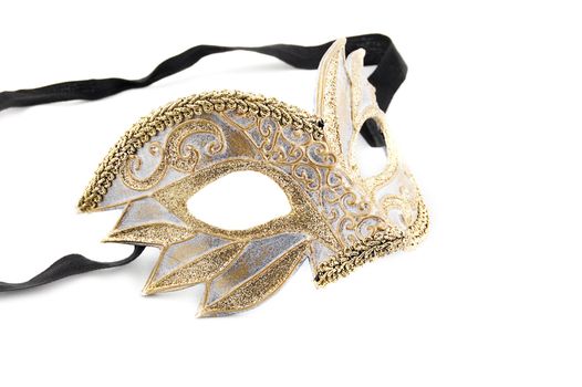 Golden venetian mask isolated on white