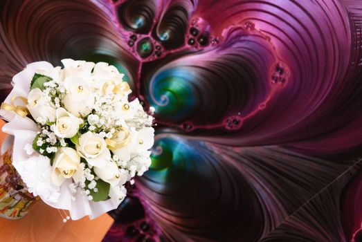 bridal bouquet of white roses on a abstract background