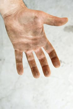 man dirty hand closeup isolated on gray background