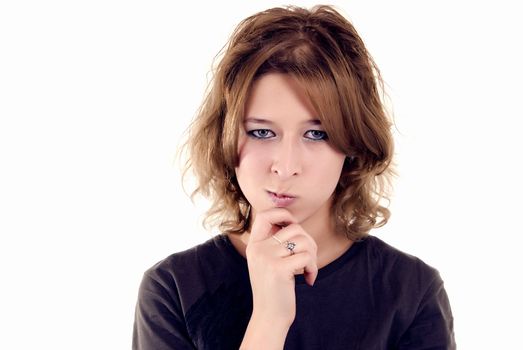 Portrait of a young beautiful girl with her hand at chin