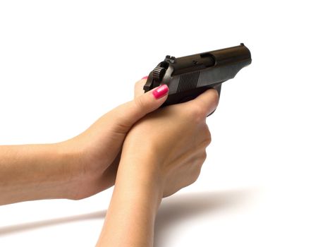 Female hands with a pistol it is isolated on a white background.