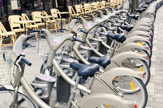 Parking of bicycles on the street Paris. Photo with tilt-shift lens