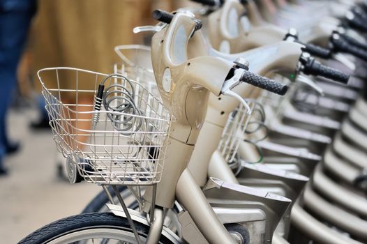 Group of bicycles in the row. Photo with tilt-shift lens