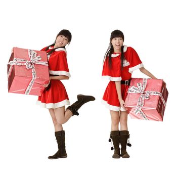 Asian christmas woman holding big gift box over white background.