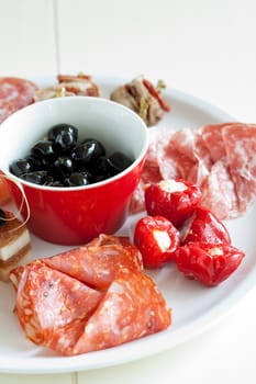 Italian plate with various delicious italian snacks