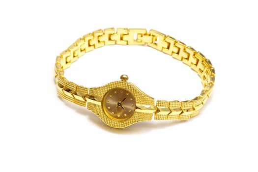 Woman gold wrist watch on white