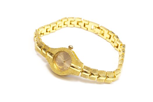 Woman gold wrist watch on white