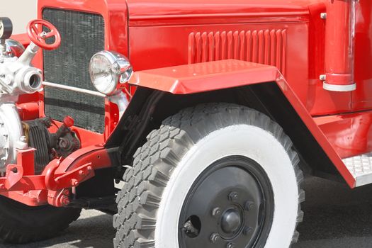 Red vintage fire truck (fire-engine) closeup