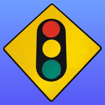 Traffic light sign over a blue sky