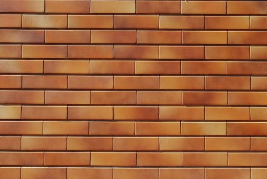 wall made of rectangular orange bricks