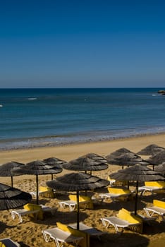 Sunbeds on Oura beach in Albufeira Portugal