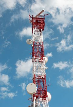 Tall telecom tower against the background of the sky