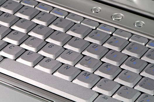 The close up of modern laptop computer's keyboard