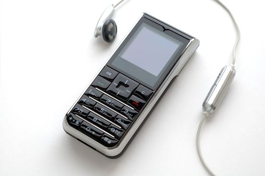 A modern mobile phone and the wired head-phone