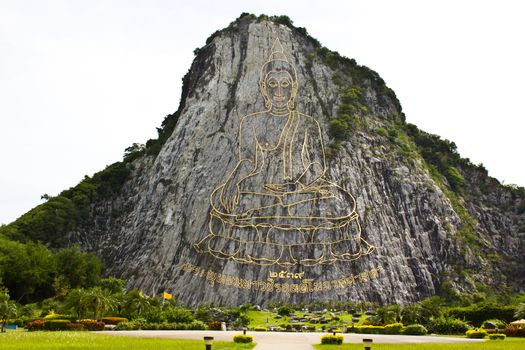 Buddha Sculptural Image On The Rock In Thailand