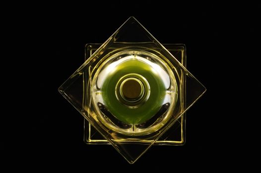 An abstract view of perfume bottle from top