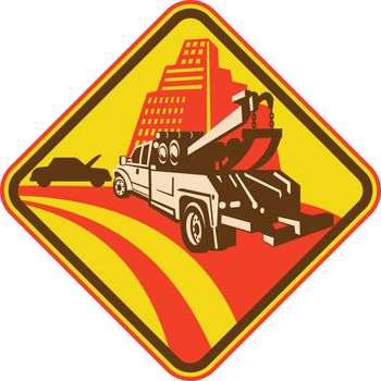 Imagery shows a tow truck arriving with car that just broke down with buildings in background. Done in four (4) colors and enclosed in a diamond shape