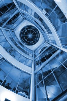 View from below of interior futuristic glass building