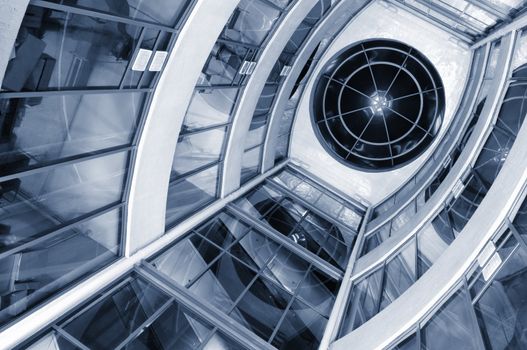 View from below of interior futuristic glass building