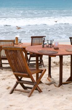 Table set of open-air restaurant, on beach